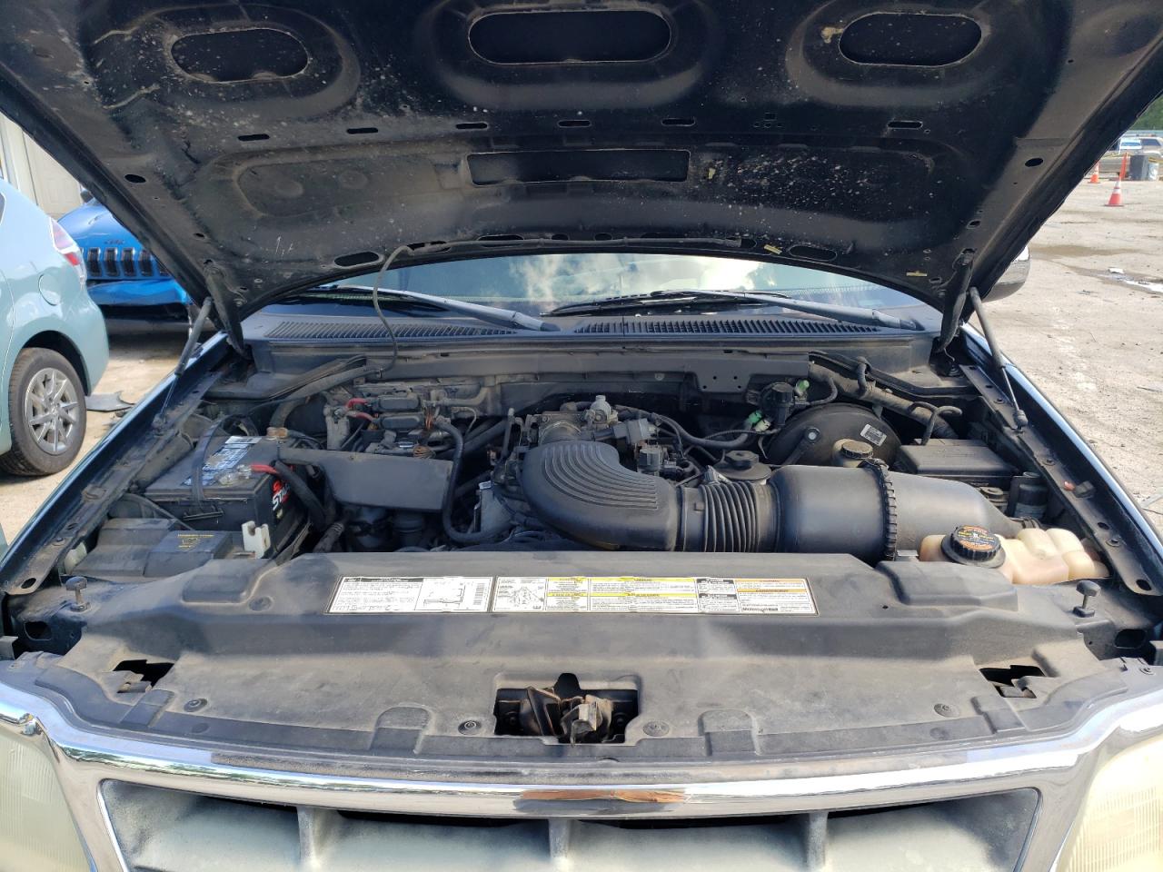 1998 Ford F150 VIN: 1FTZF17WXWNB72117 Lot: 61891384