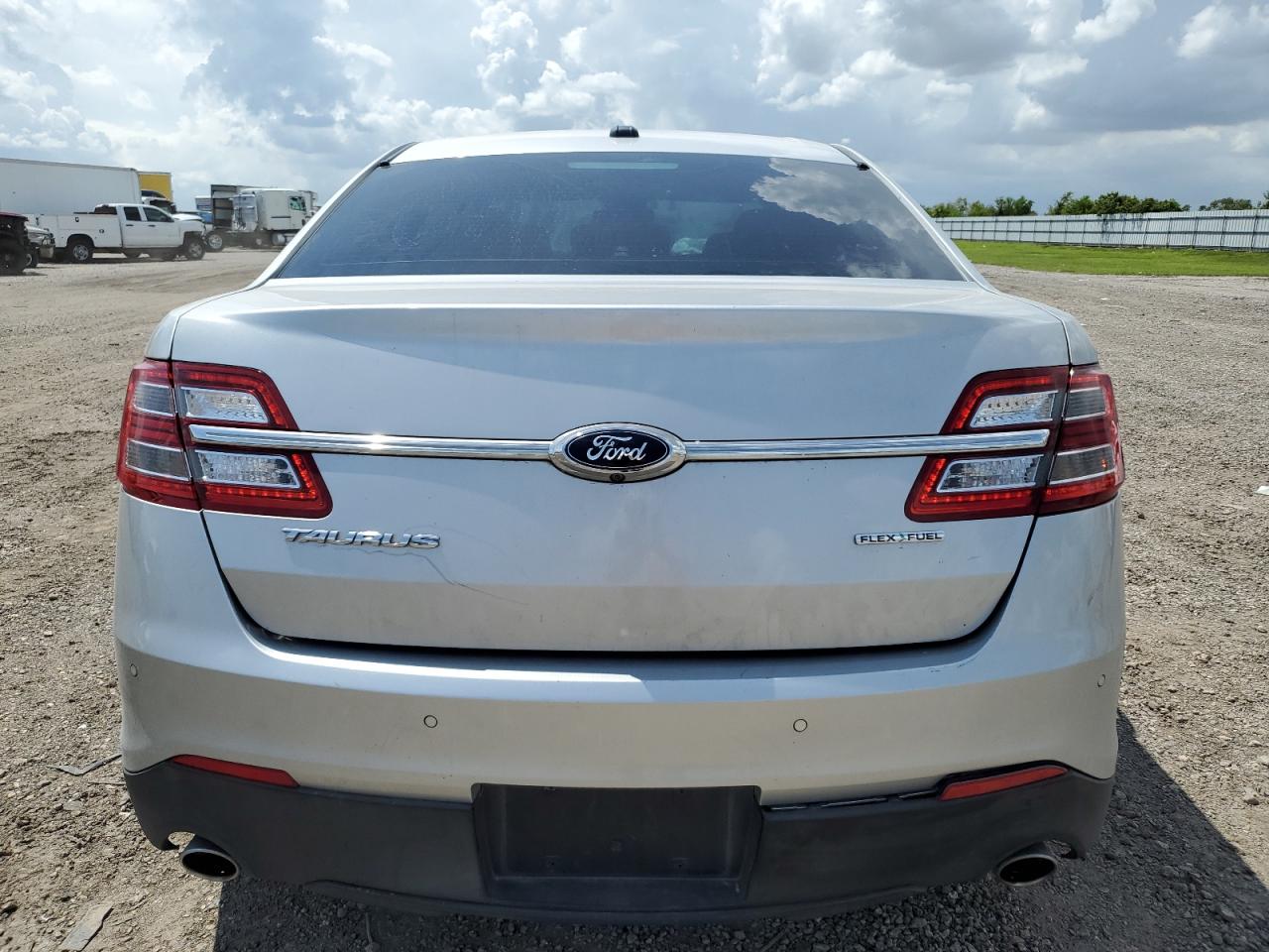 2016 Ford Taurus Limited VIN: 1FAHP2J85GG107261 Lot: 64293104