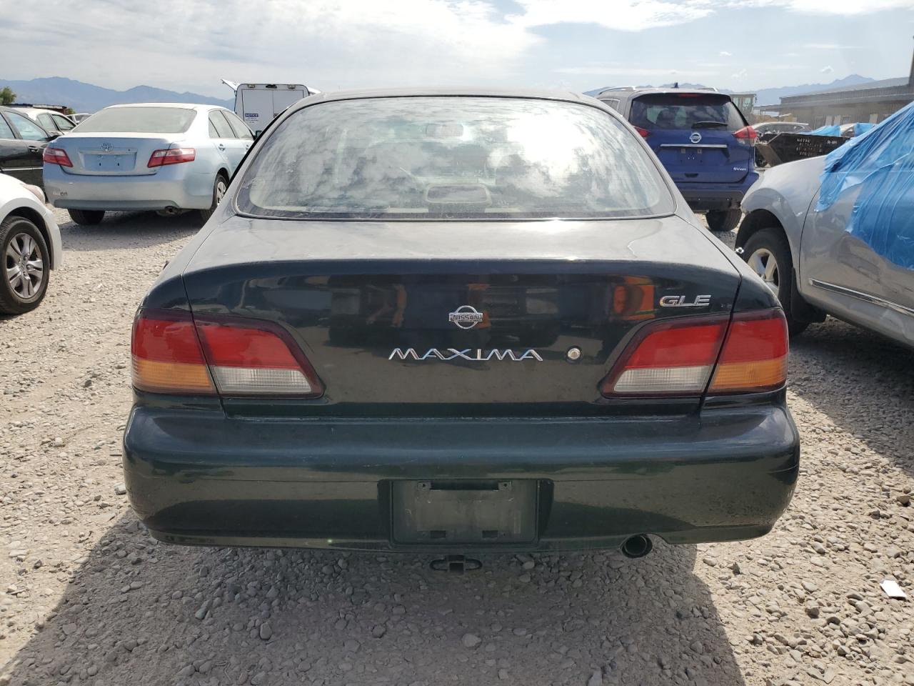 1998 Nissan Maxima Gle VIN: JN1CA21D9WM910600 Lot: 63454474