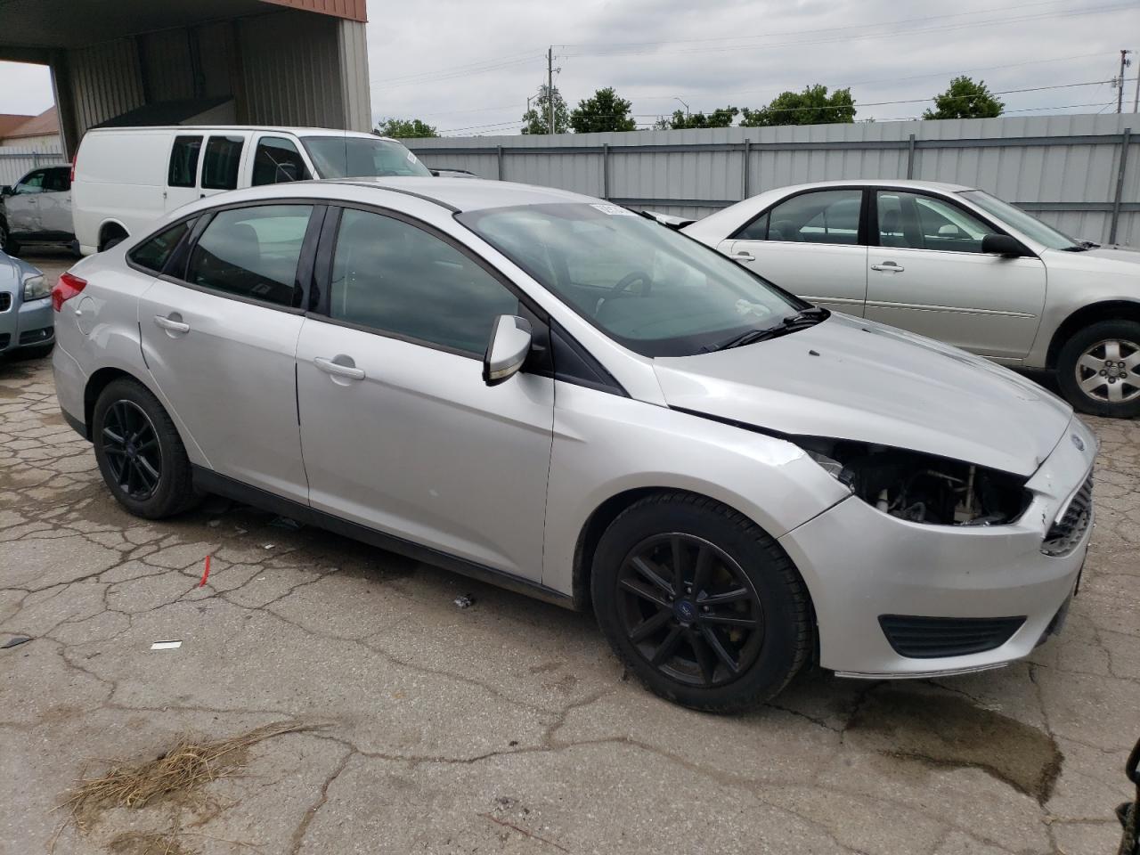 VIN 1FADP3F22HL248659 2017 FORD FOCUS no.4