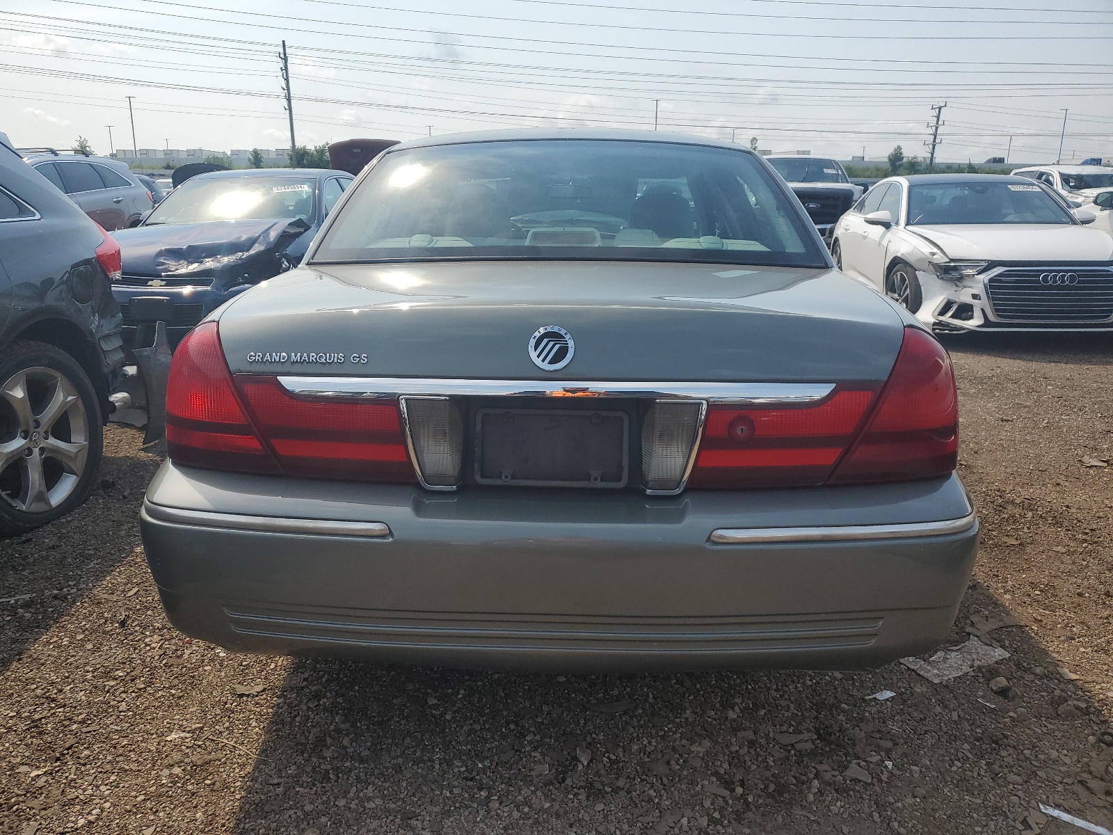 2MEFM74W74X682077 2004 Mercury Grand Marquis Gs