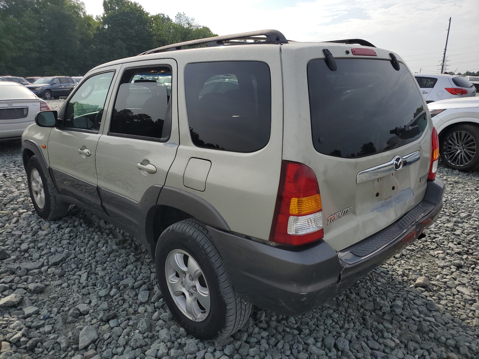 4F2YZ04163KM46657 2003 Mazda Tribute Lx