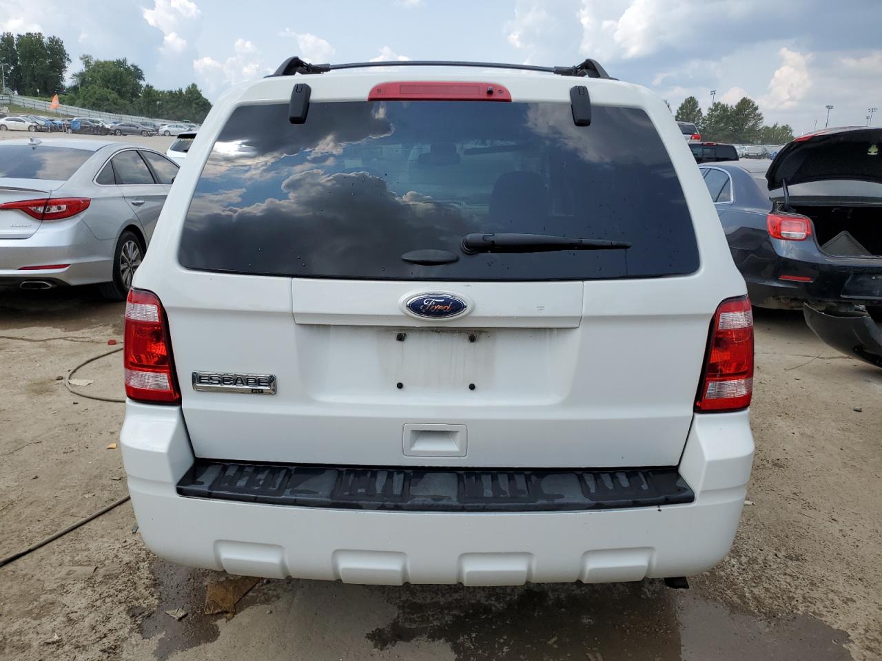 2012 Ford Escape Xlt VIN: 1FMCU0D70CKA38552 Lot: 63772144