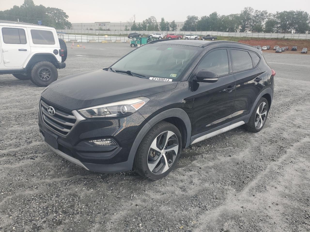 KM8J3CA24HU566160 2017 HYUNDAI TUCSON - Image 1