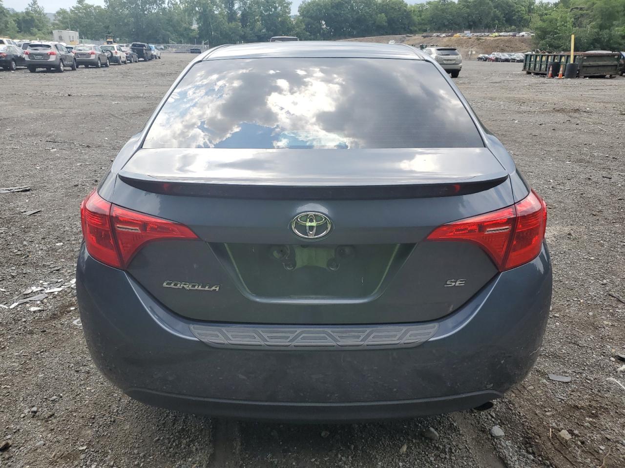 2018 Toyota Corolla L VIN: 2T1BURHE4JC047685 Lot: 61020034