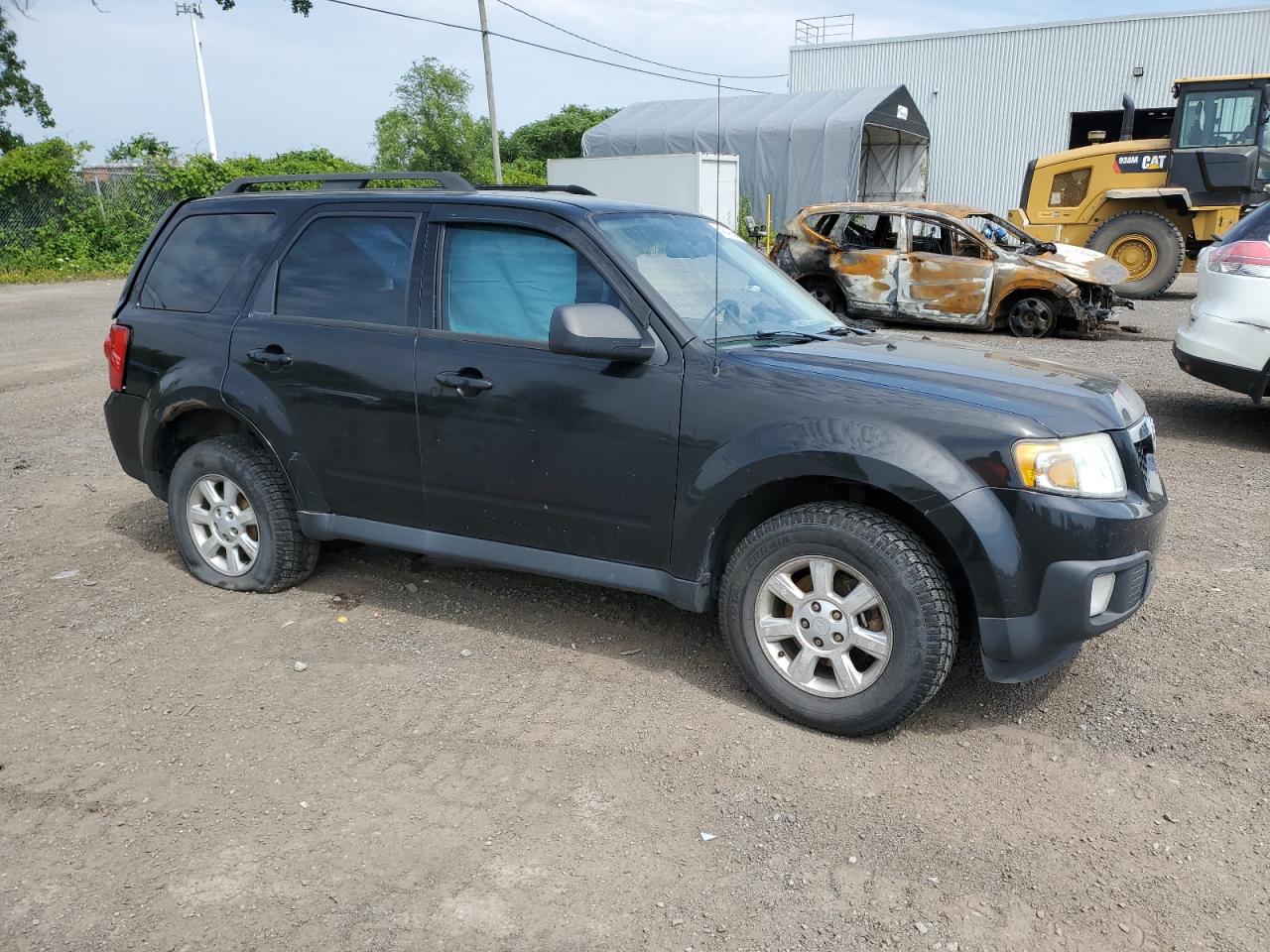 2011 Mazda Tribute I VIN: 4F2CY0C74BKM05106 Lot: 64842864