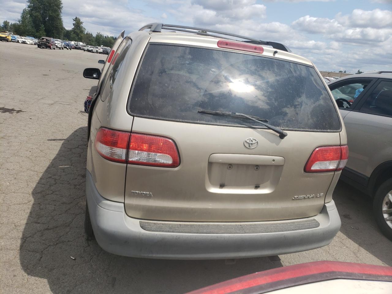 2001 Toyota Sienna Le VIN: 4T3ZF13C91U385430 Lot: 64051904