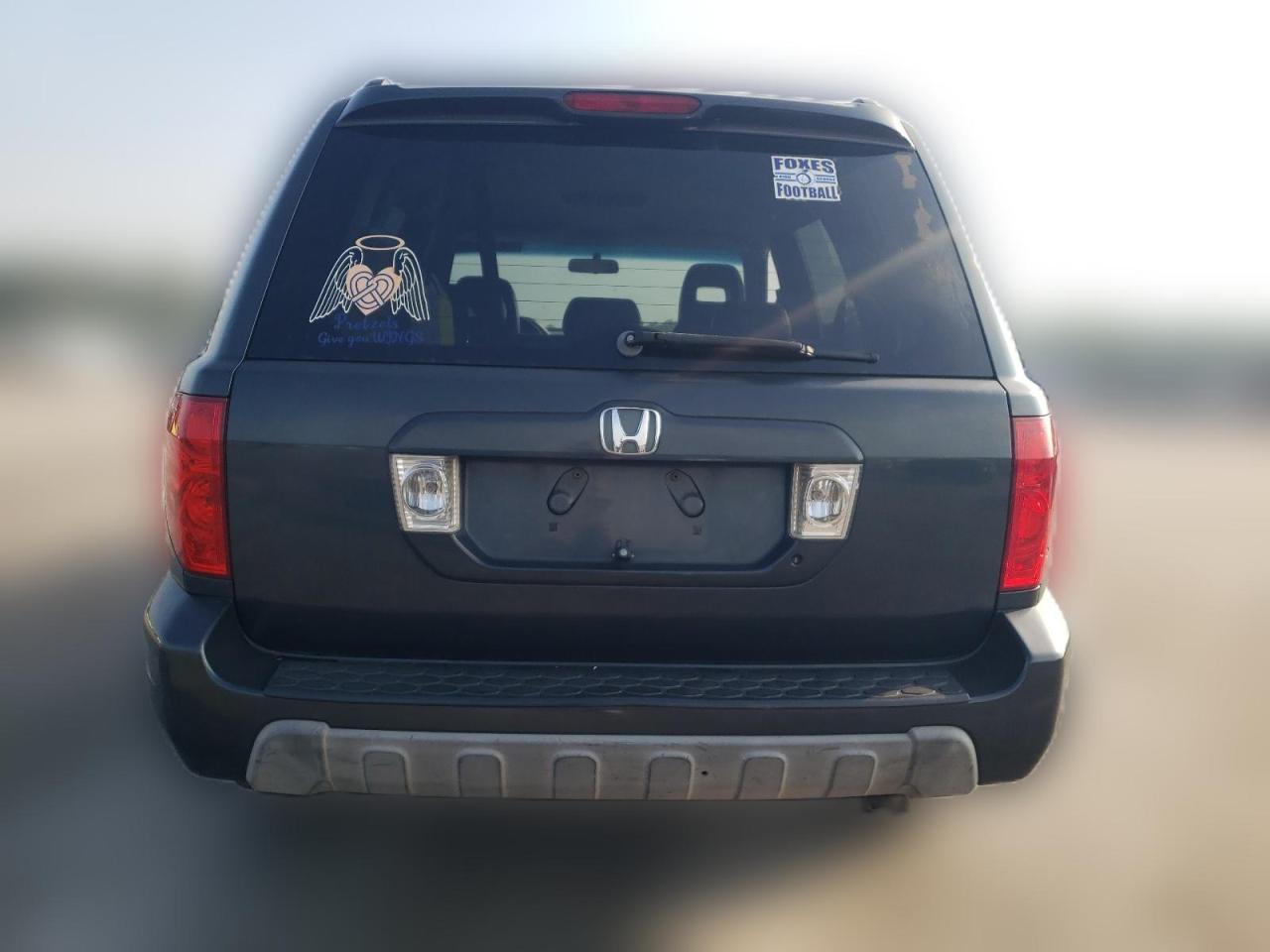 2003 Honda Pilot Exl VIN: 2HKYF18503H571941 Lot: 63788934