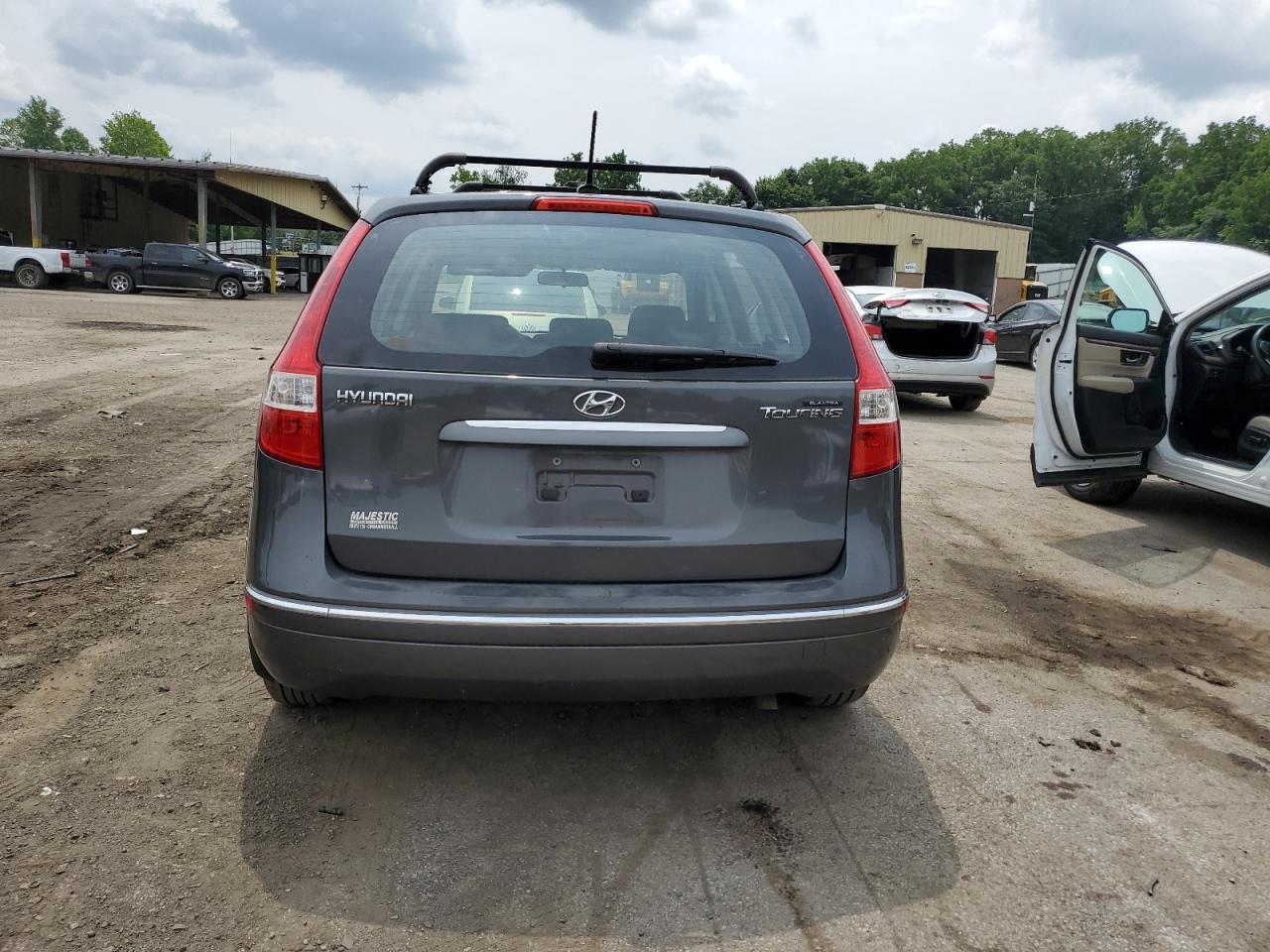 2009 Hyundai Elantra Touring VIN: KMHDC86E09U038985 Lot: 64592294