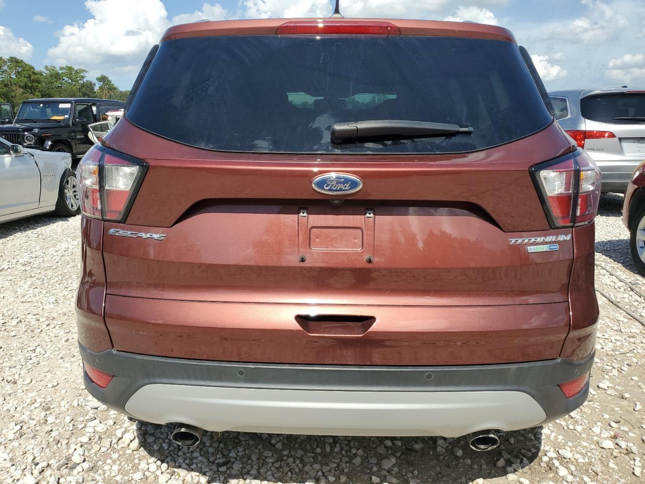 2018 Ford Escape Titanium VIN: 1FMCU9J95JUA67024 Lot: 65172184