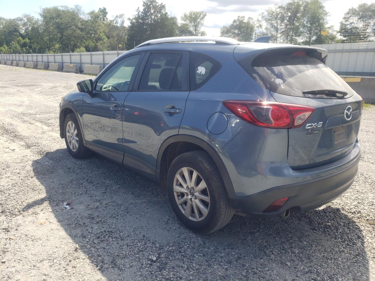2014 Mazda Cx-5 Touring VIN: JM3KE2CY9E0397908 Lot: 62738774