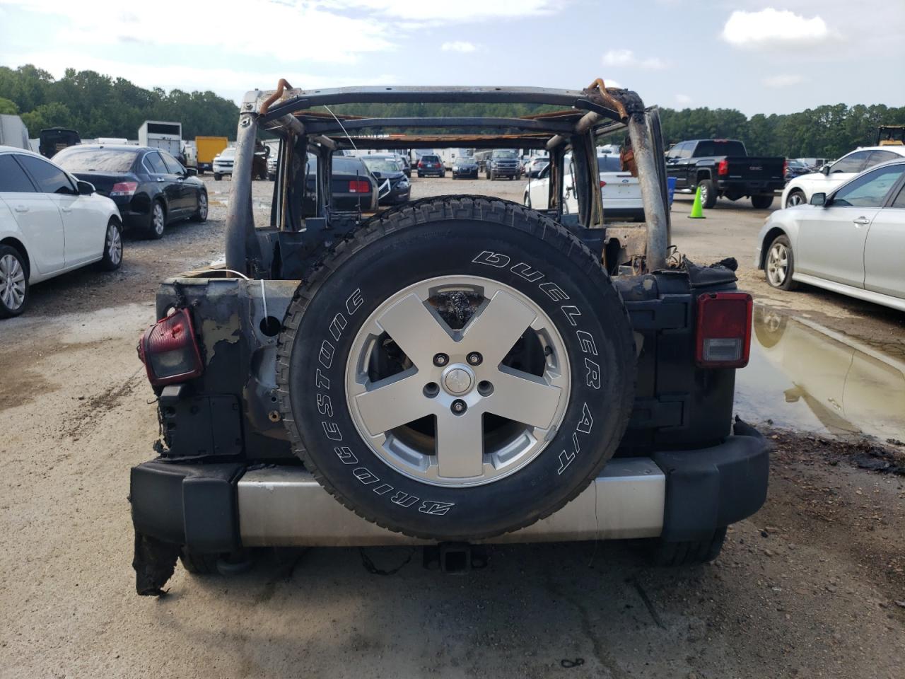 1J4BA5H11AL139306 2010 Jeep Wrangler Unlimited Sahara