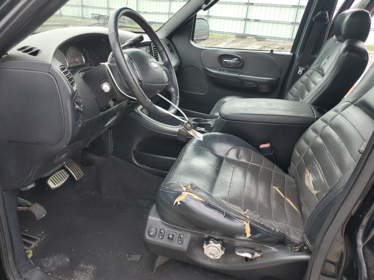 2002 Ford F150 Supercrew Harley Davidson VIN: 1FTRW07312KE11467 Lot: 80796425