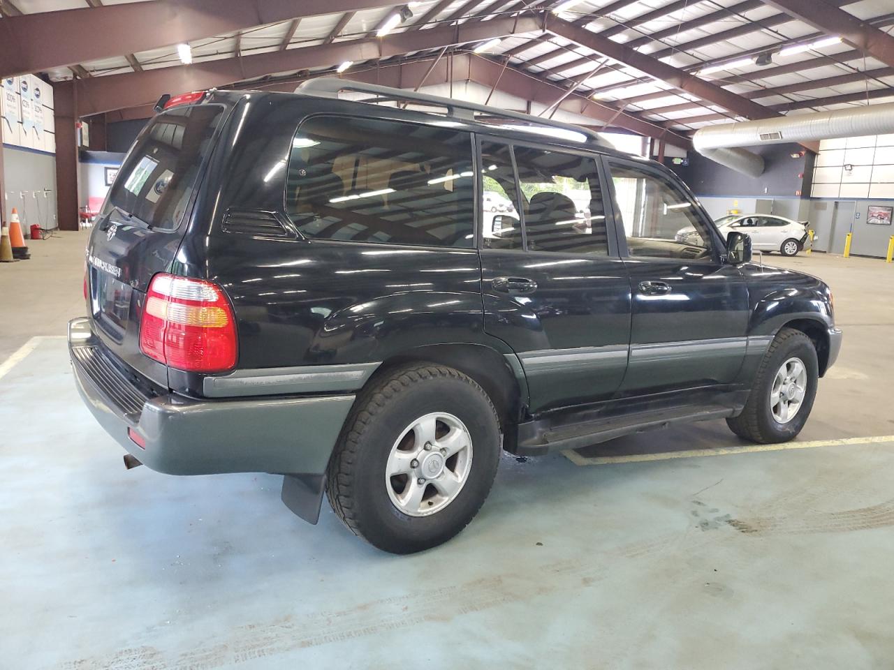 1999 Toyota Land Cruiser VIN: JT3HT05J2X0069086 Lot: 64736254
