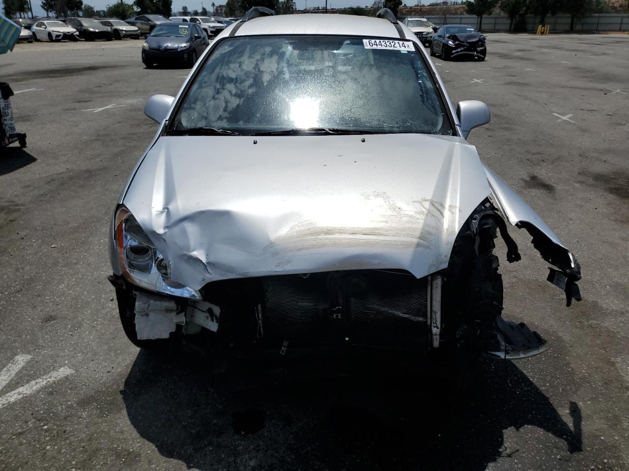 2009 Kia Rondo Base VIN: KNAFG529X97276282 Lot: 64433214
