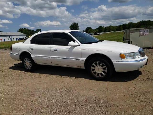 2001 Lincoln Continental VIN: 1LNHM97V21Y666725 Lot: 64866744