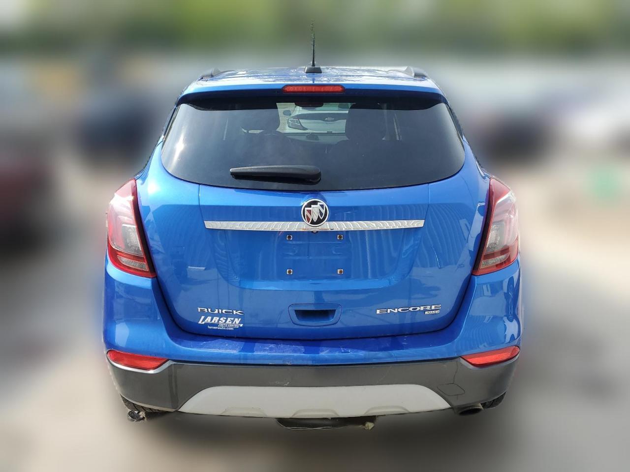 2018 Buick Encore Essence VIN: KL4CJGSB3JB552304 Lot: 64891704