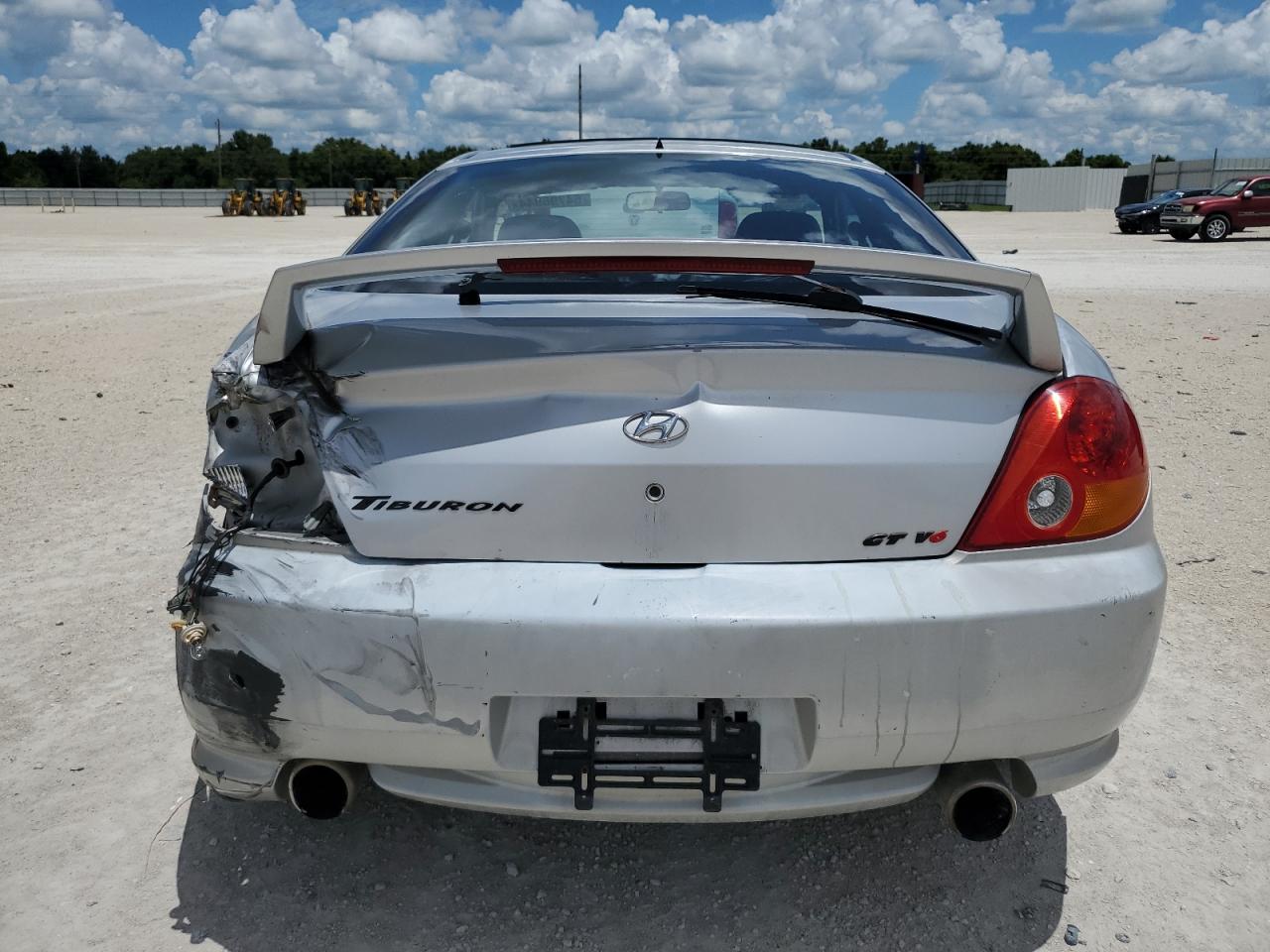 2004 Hyundai Tiburon Gt VIN: KMHHN65F64U117807 Lot: 64796944