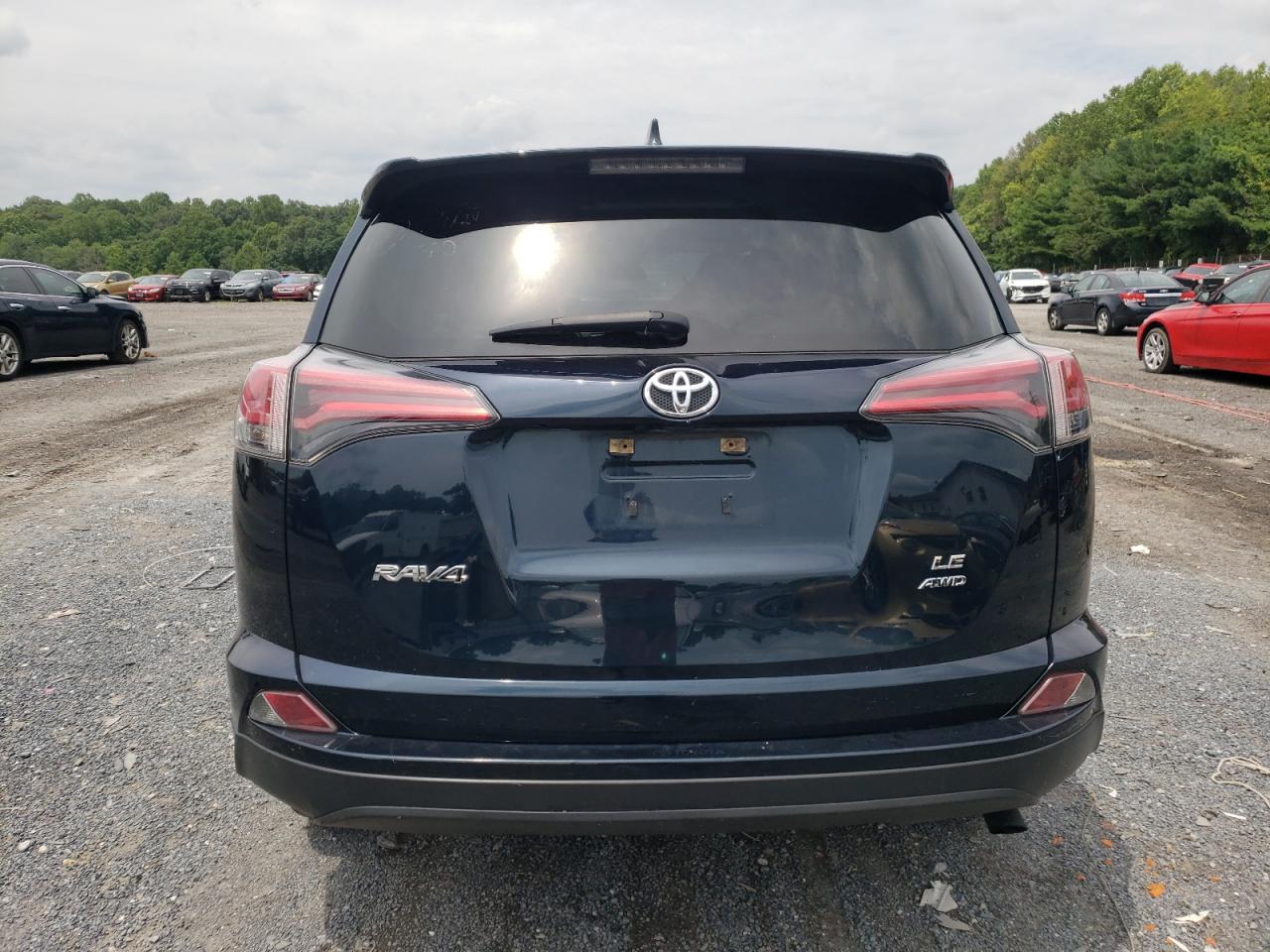 2018 Toyota Rav4 Le VIN: JTMBFREVXJJ180048 Lot: 63305514