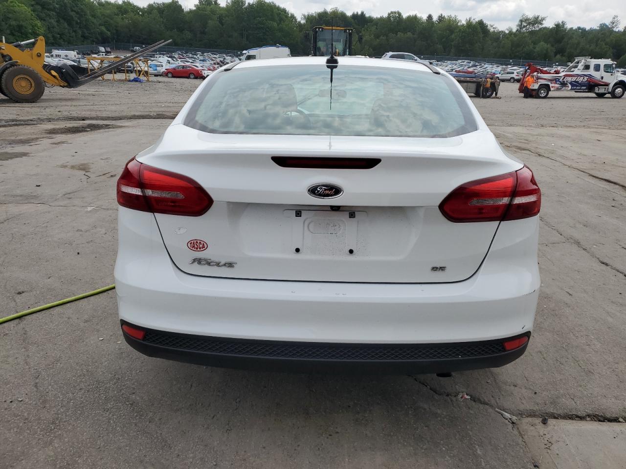 2018 Ford Focus Se VIN: 1FADP3F27JL234004 Lot: 64679734