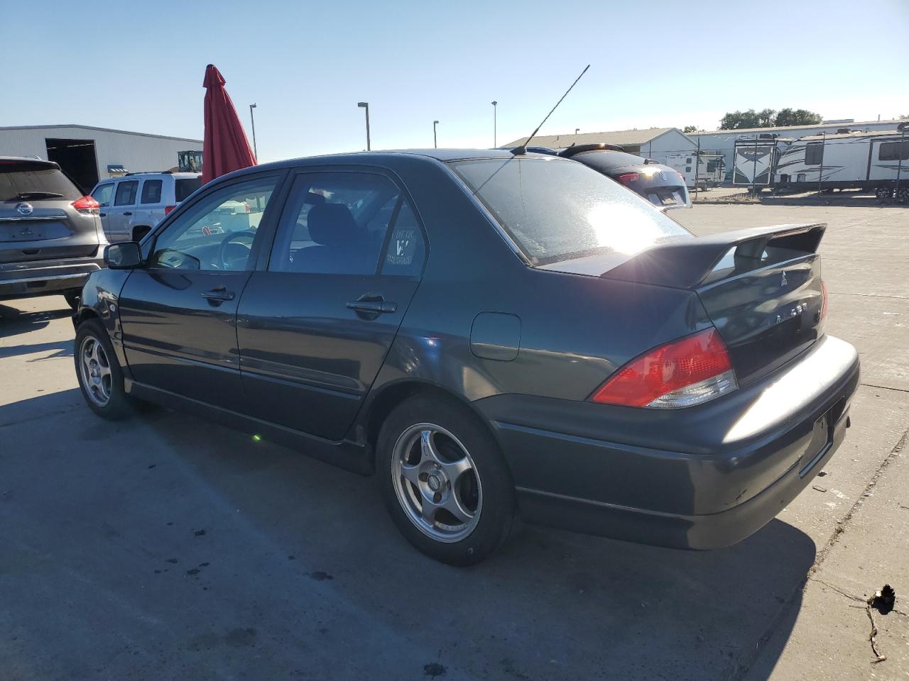 2002 Mitsubishi Lancer Oz Rally VIN: JA3AJ86E22U054302 Lot: 63143044