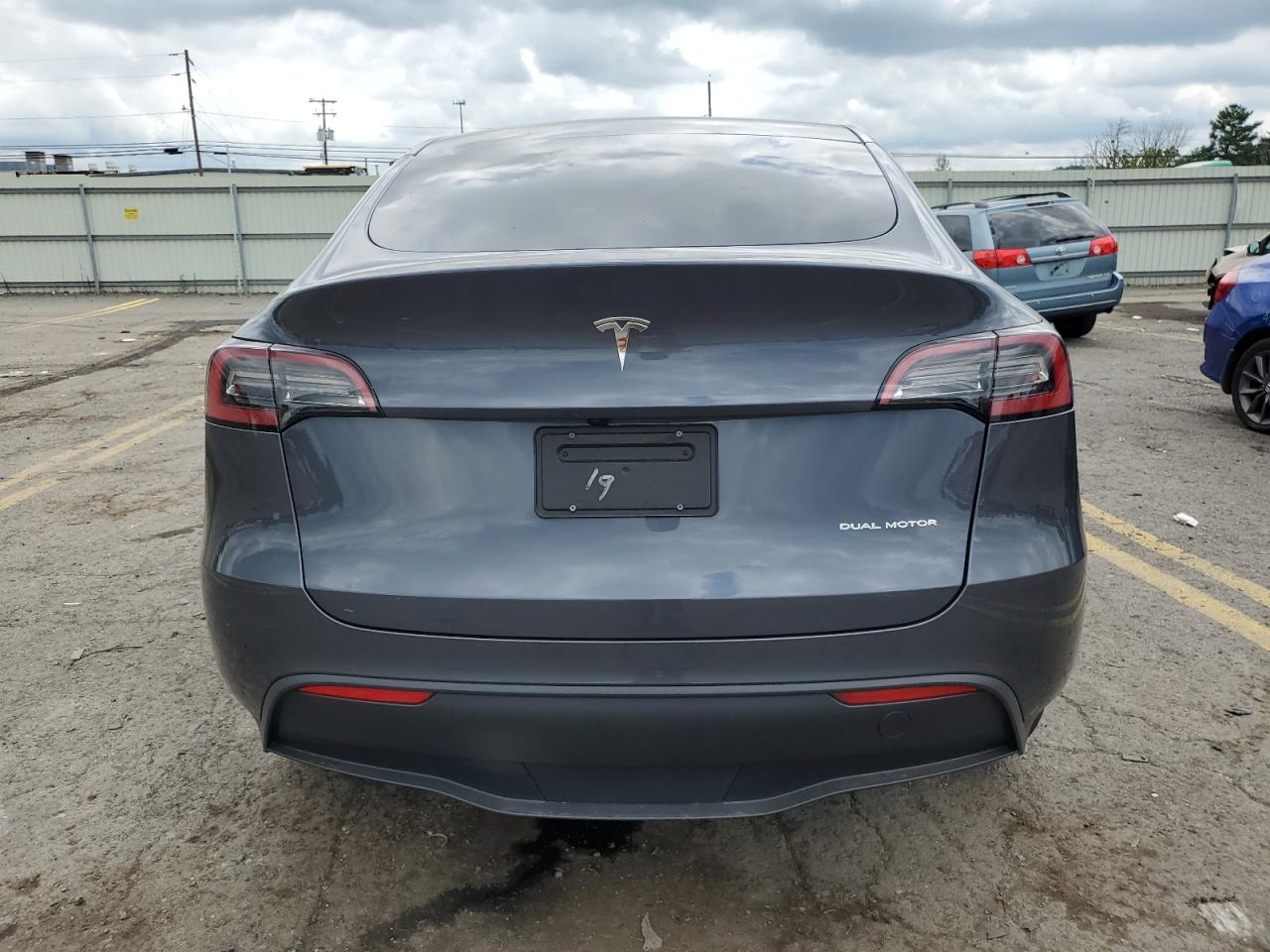 2023 Tesla Model Y VIN: 7SAYGDEE4PF851842 Lot: 65385954