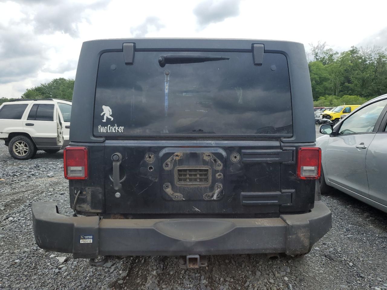 2011 Jeep Wrangler Sport VIN: 1J4AA2D1XBL570213 Lot: 63454544