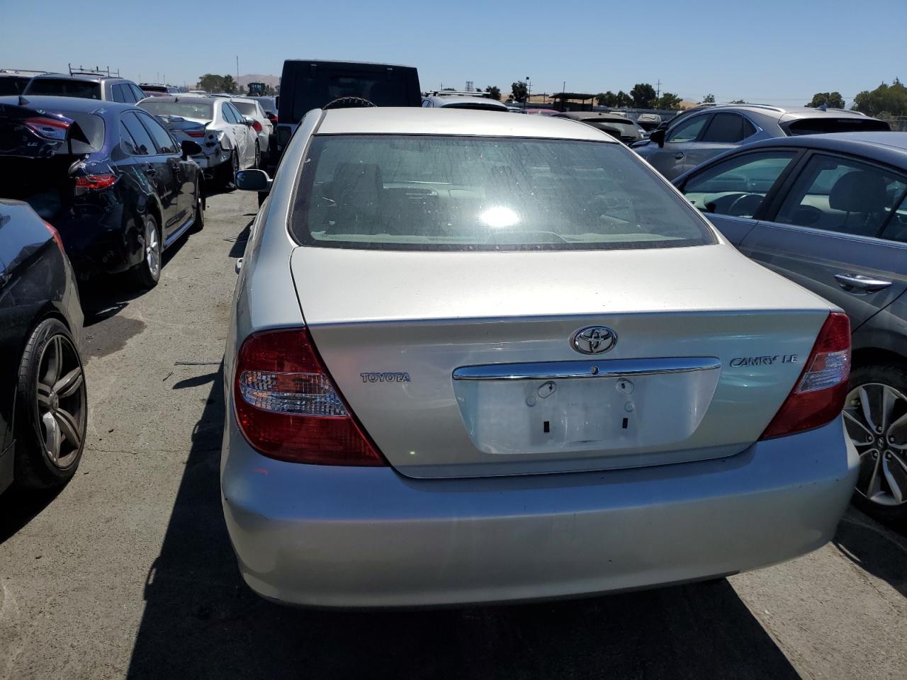 2004 Toyota Camry Le VIN: JTDBE32KX40264911 Lot: 63928584