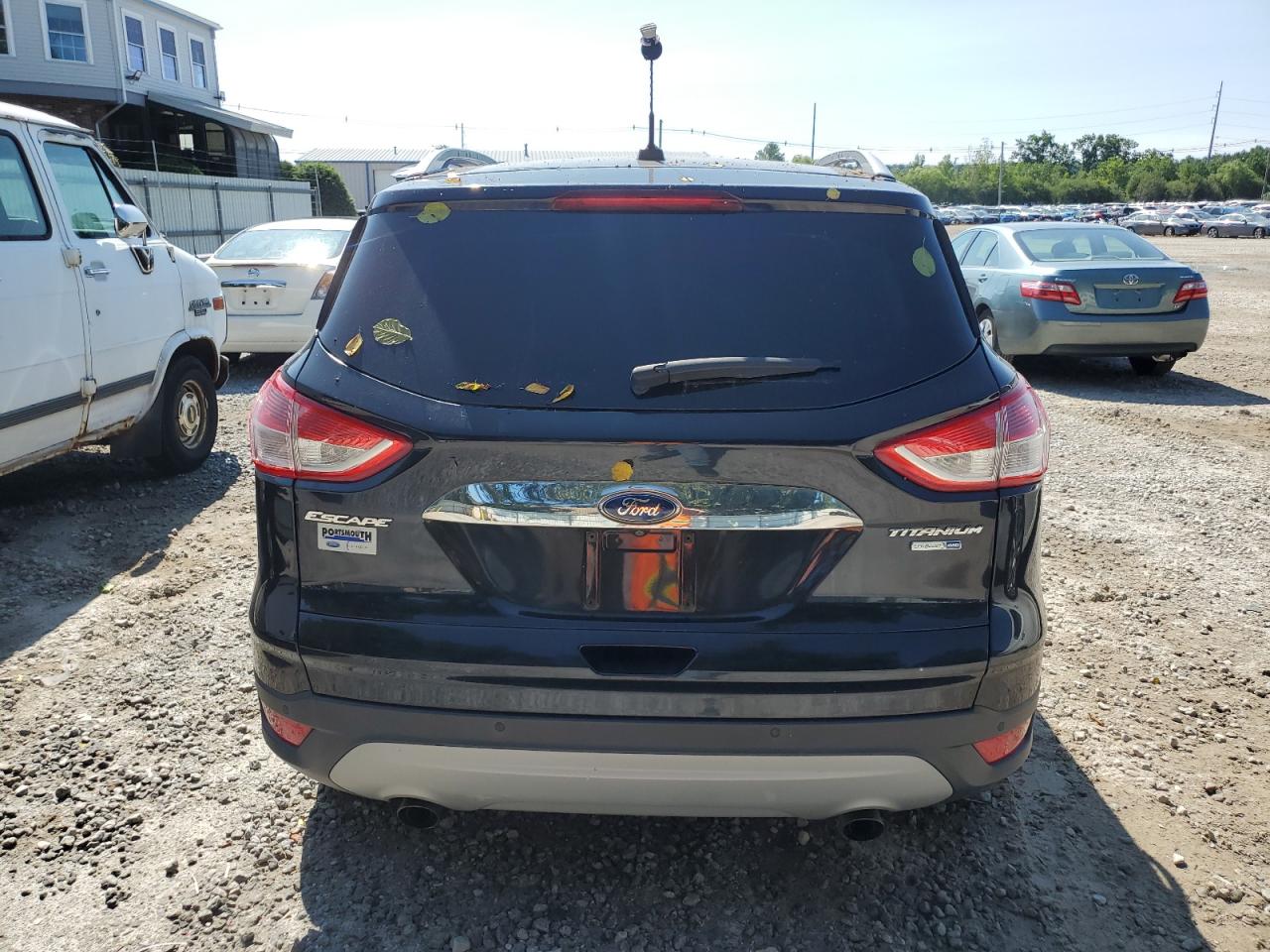 2014 Ford Escape Titanium VIN: 1FMCU9J99EUB74938 Lot: 64480754