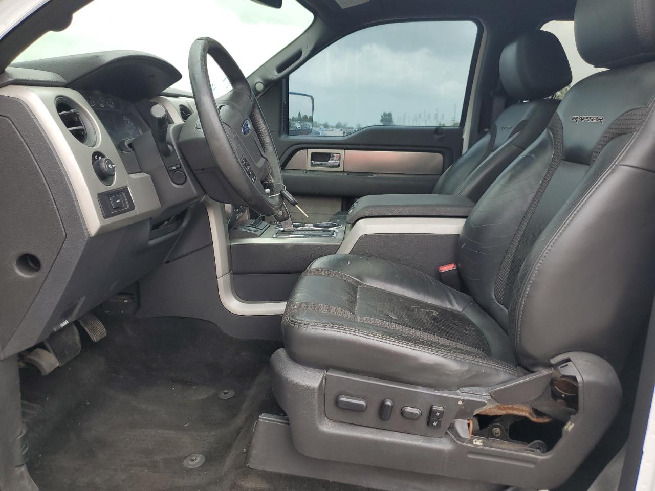 2013 Ford F150 Svt Raptor VIN: 1FTFW1R61DFB09897 Lot: 62761954