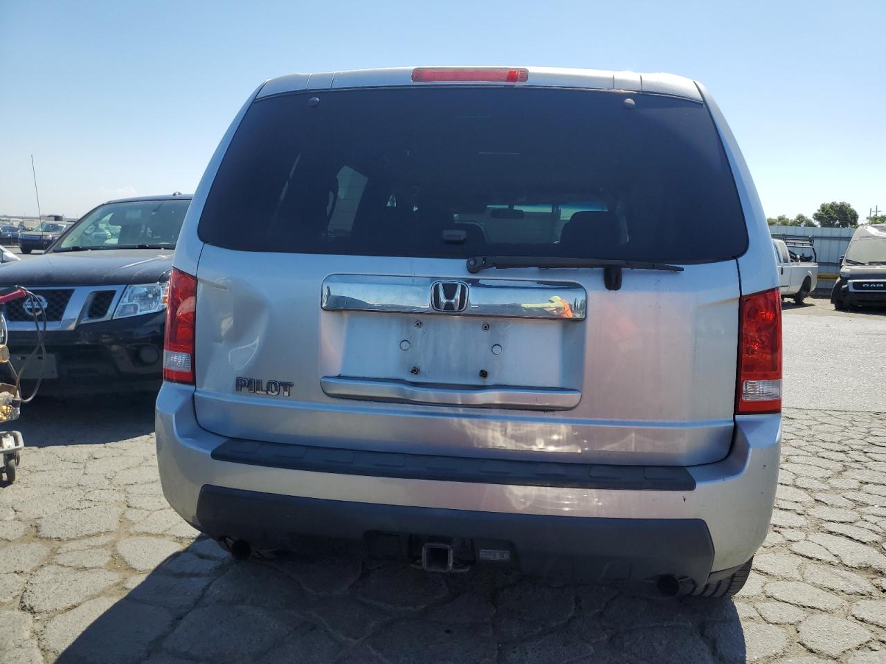 2011 Honda Pilot Lx VIN: 5FNYF3H25BB023402 Lot: 62761144