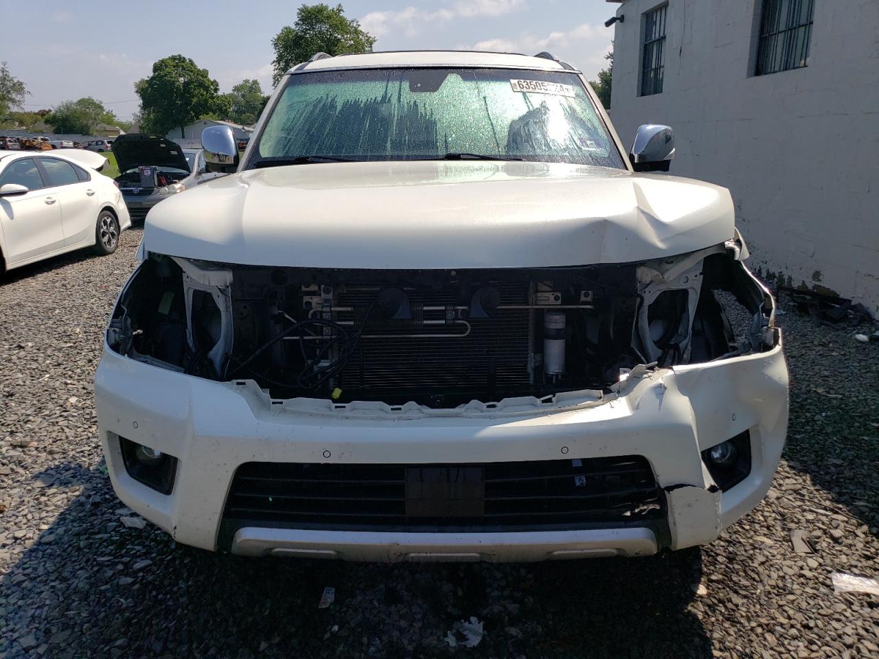 2017 Nissan Armada Platinum VIN: JN8AY2NE8H9704746 Lot: 63505824