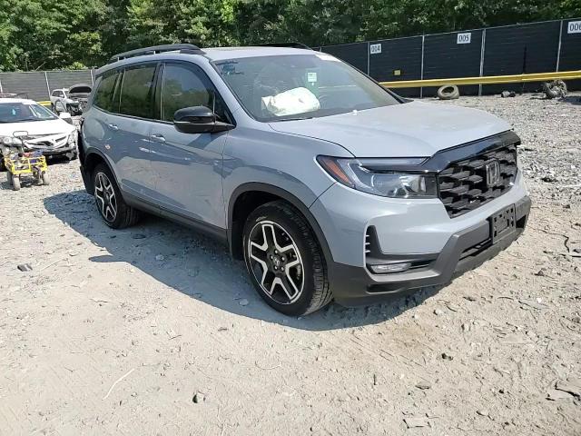 2023 Honda Passport Elite VIN: 5FNYF8H05PB021569 Lot: 63390614