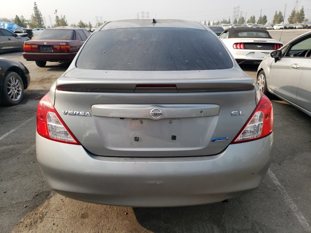 2013 Nissan Versa S VIN: 3N1CN7AP0DL882396 Lot: 62635584