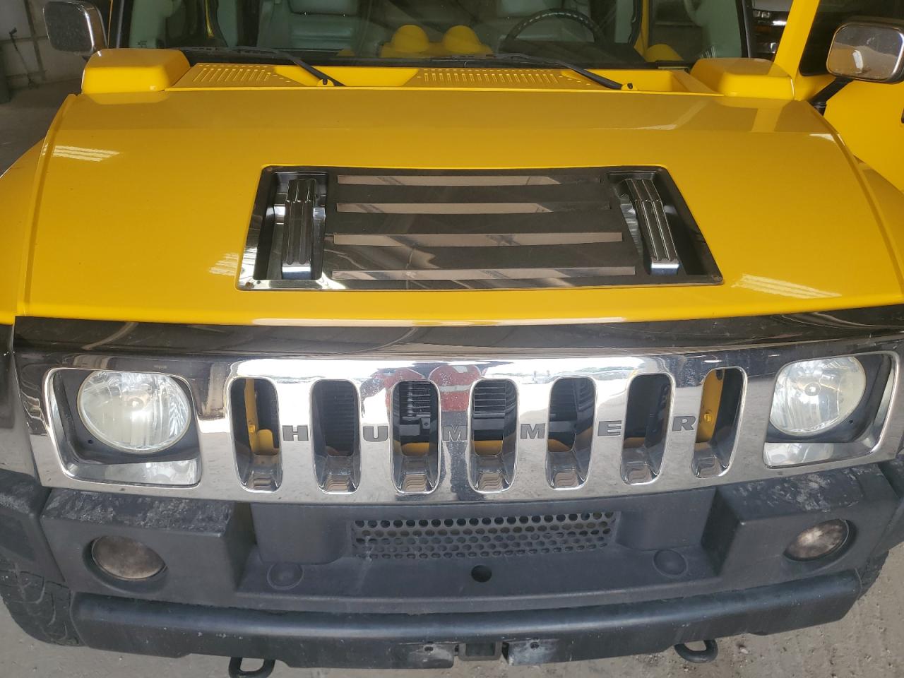2003 Hummer H2 VIN: 5GRGN23U33H128327 Lot: 62786604