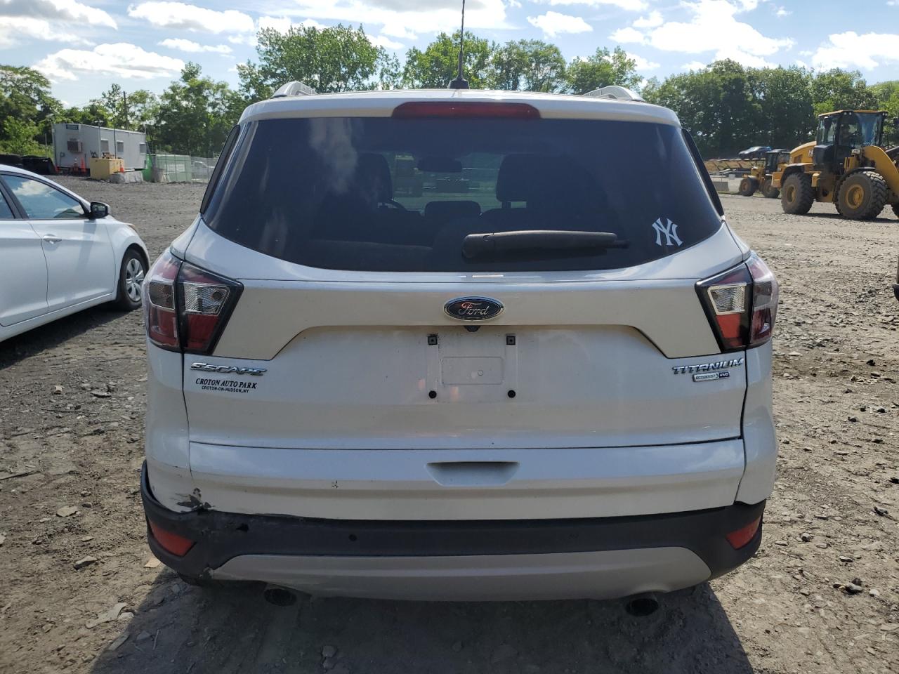 2017 Ford Escape Titanium VIN: 1FMCU9J9XHUA07556 Lot: 62742434
