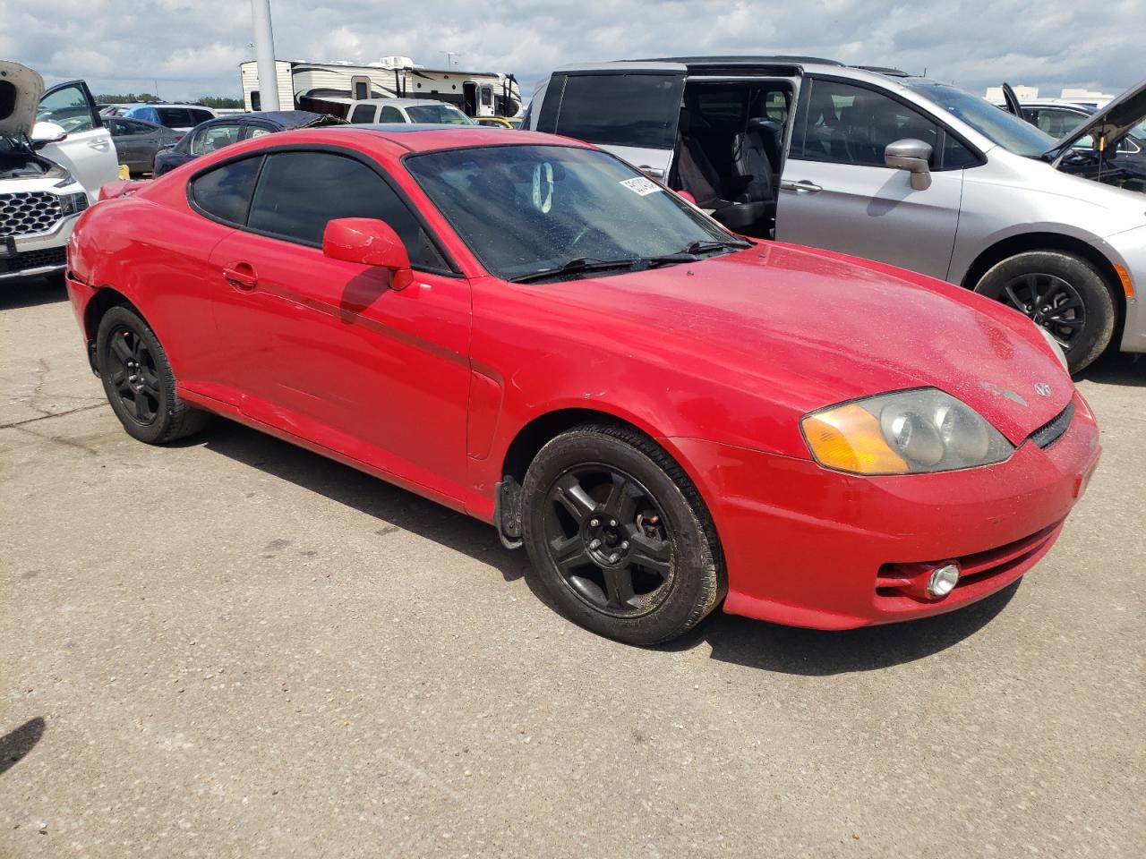 2003 Hyundai Tiburon VIN: KMHHM65D93U099044 Lot: 65124024