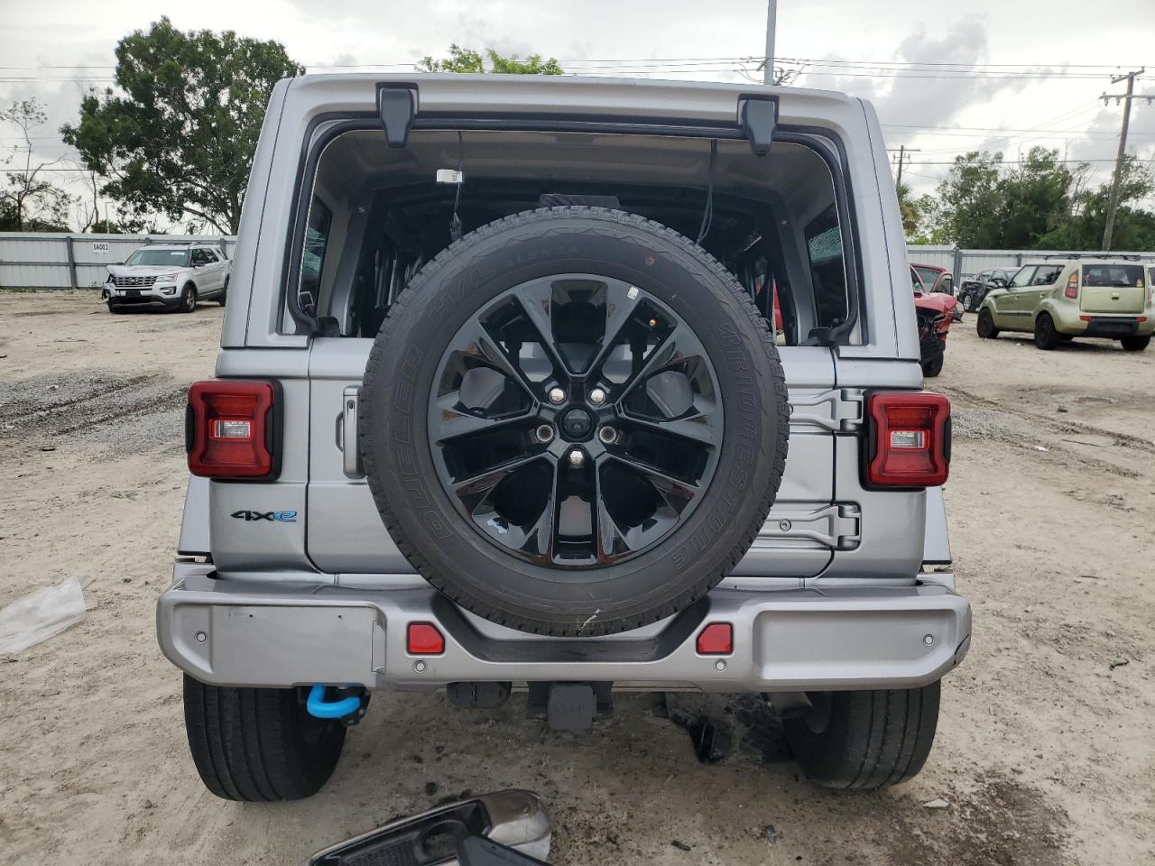 2021 Jeep Wrangler Unlimited Sahara 4Xe VIN: 1C4JJXP69MW676406 Lot: 62119404