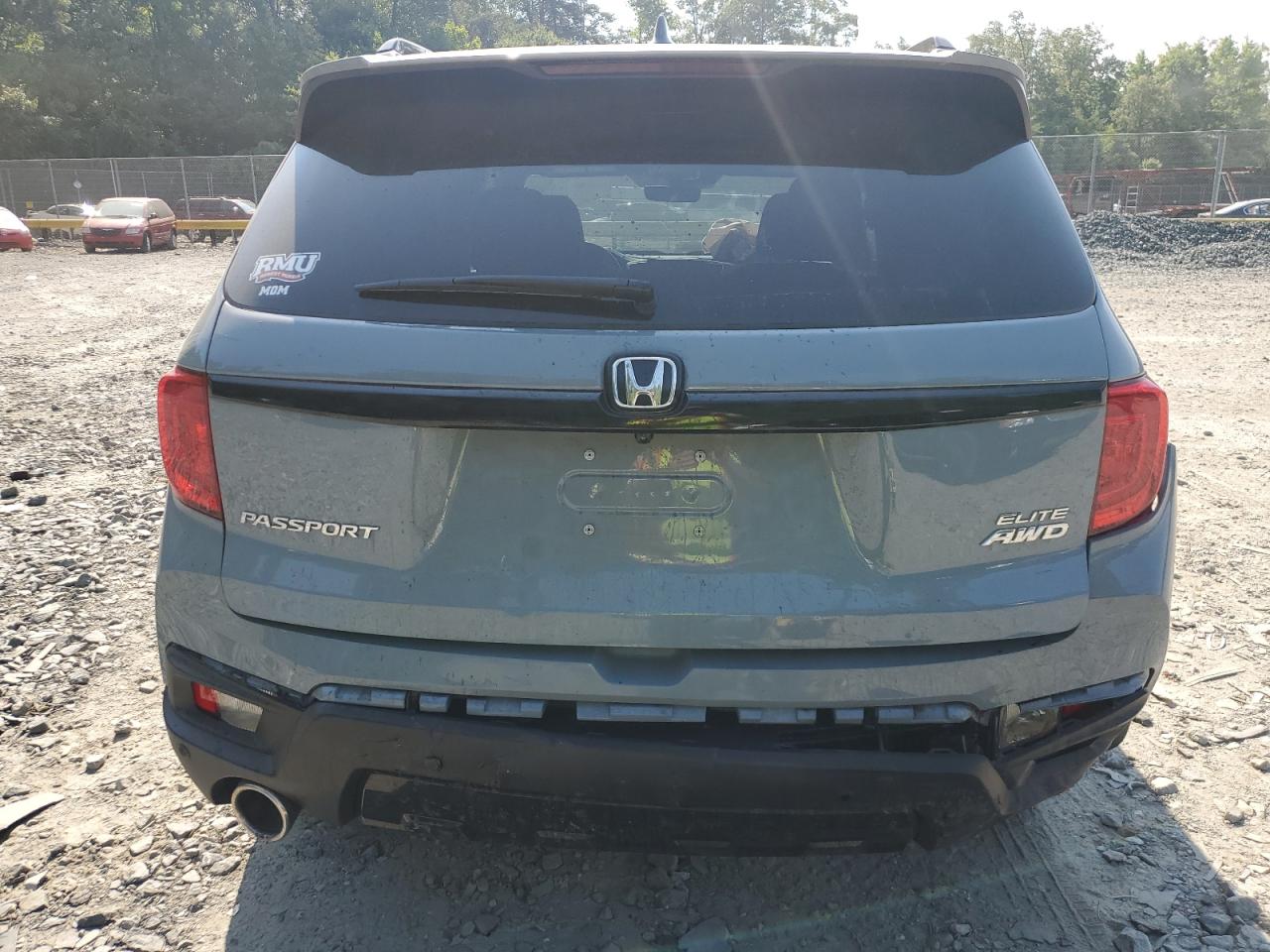 2023 Honda Passport Elite VIN: 5FNYF8H05PB021569 Lot: 63390614