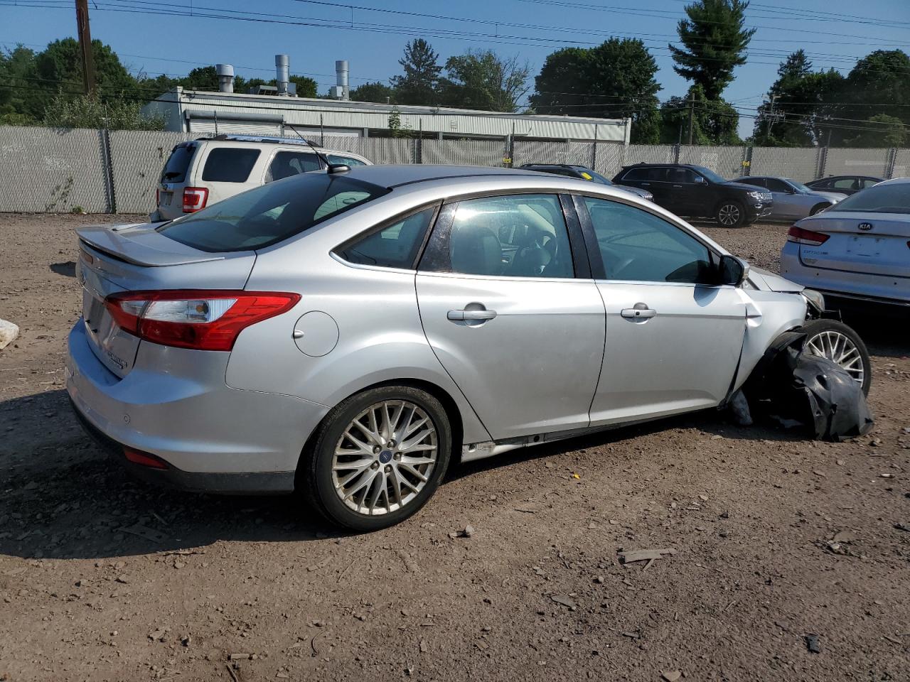 2013 Ford Focus Titanium VIN: 1FADP3J20DL120468 Lot: 62668874