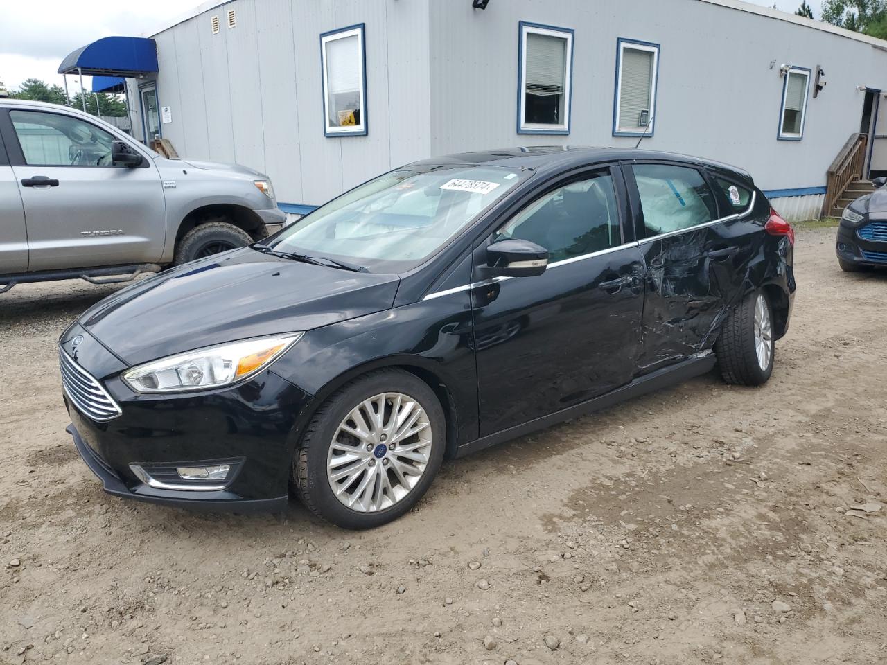 2017 Ford Focus Titanium VIN: 1FADP3N24HL200713 Lot: 64478374