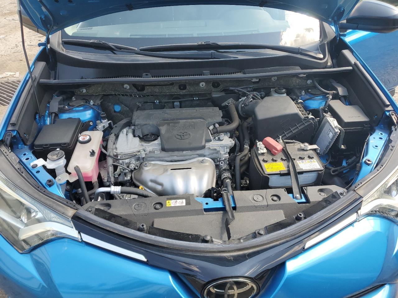 2018 Toyota Rav4 Le VIN: JTMBFREV8JD247034 Lot: 63970874