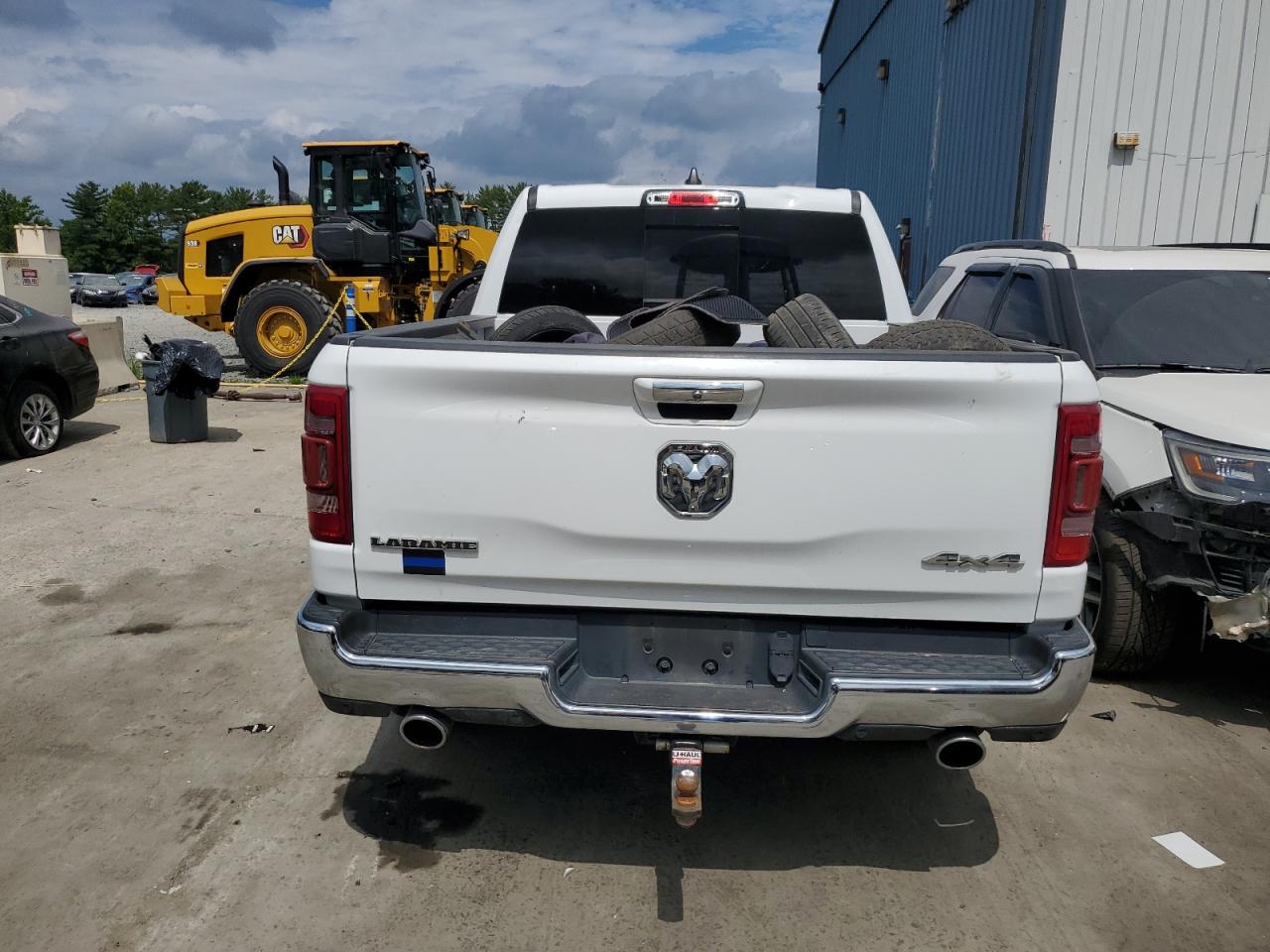 2021 Ram 1500 Laramie VIN: 1C6SRFJTXMN557055 Lot: 64162354