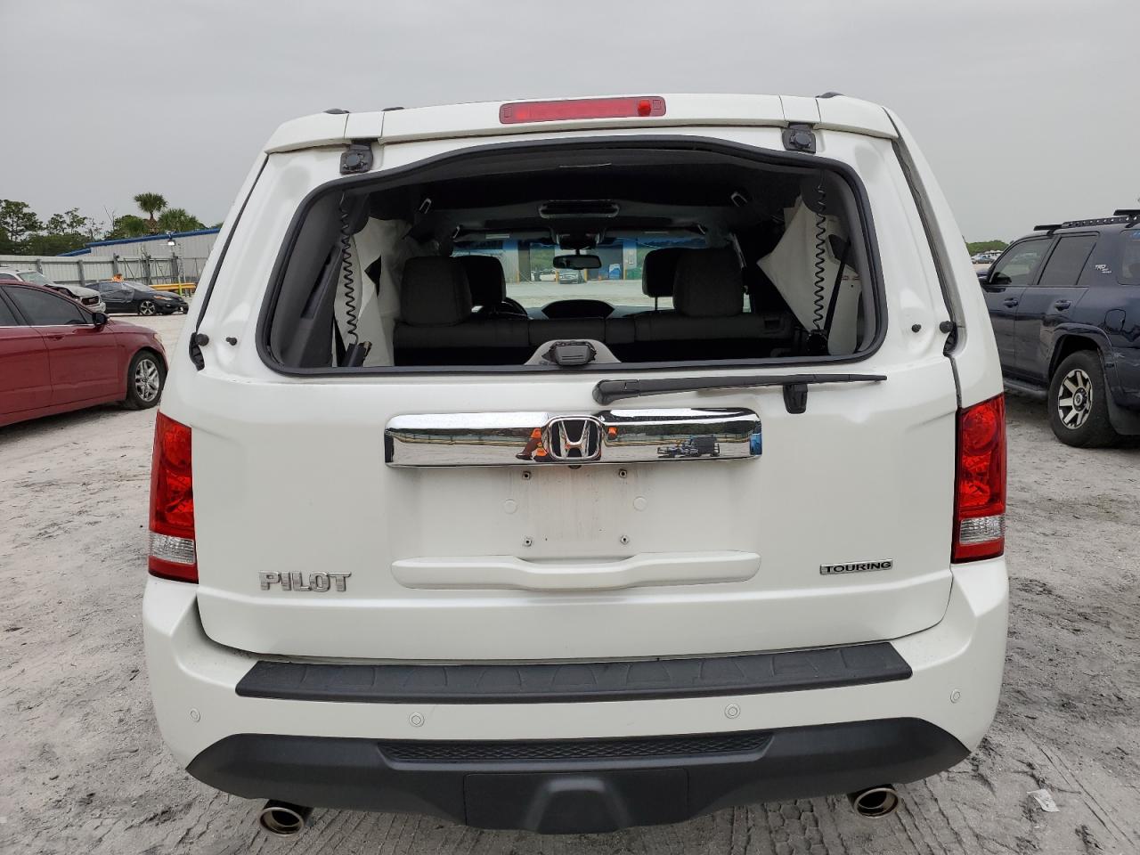 2012 Honda Pilot Touring VIN: 5FNYF3H99CB034322 Lot: 62675054