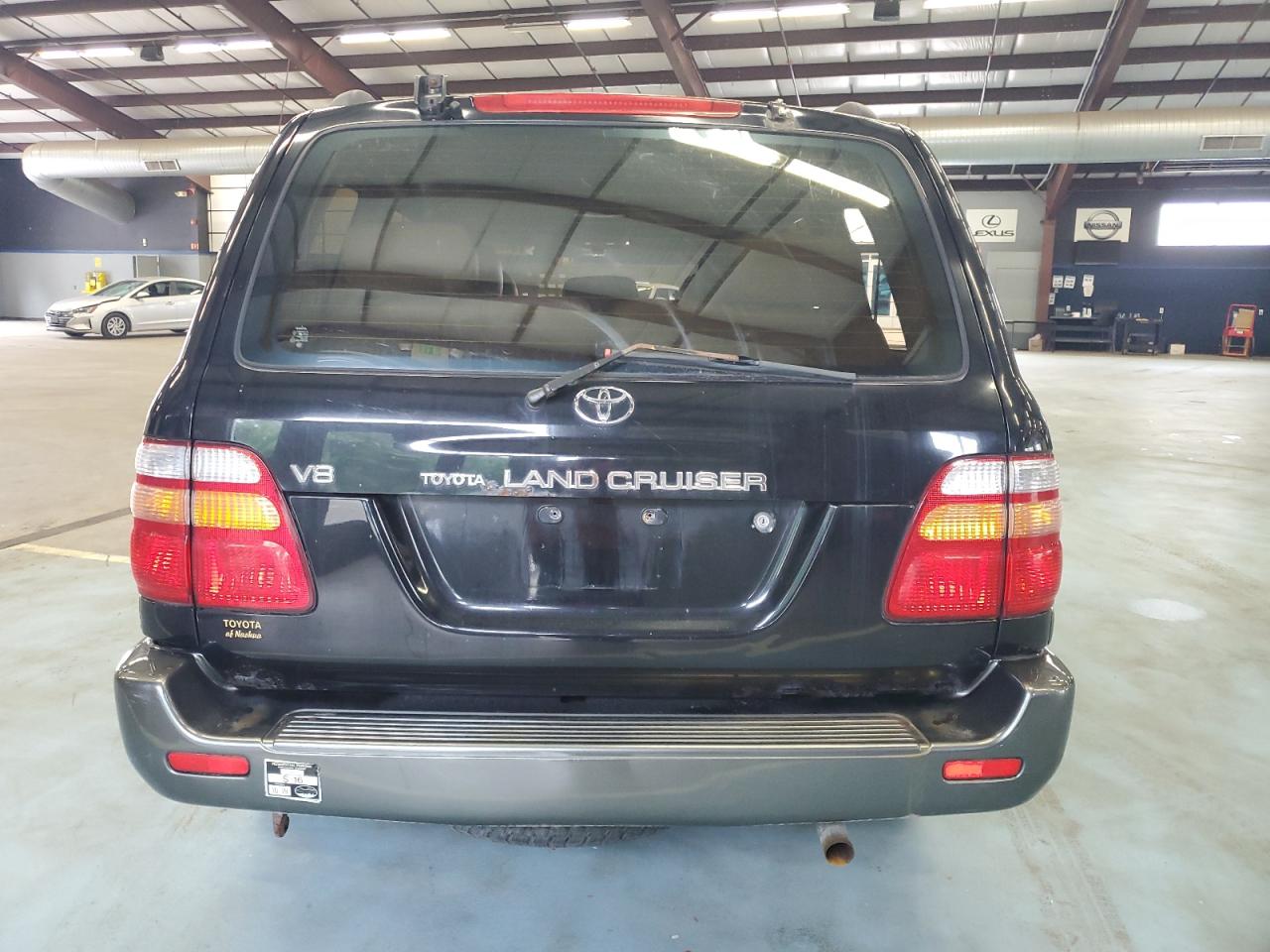 1999 Toyota Land Cruiser VIN: JT3HT05J2X0069086 Lot: 64736254