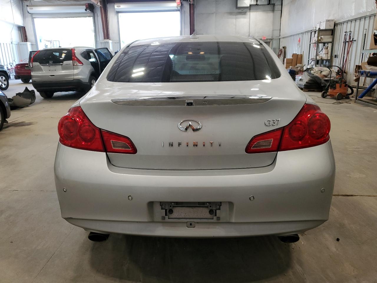 2011 Infiniti G37 Base VIN: JN1CV6APXBM501957 Lot: 63670184