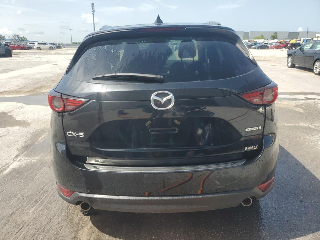 2021 Mazda Cx-5 Grand Touring VIN: JM3KFADM3M0350505 Lot: 64015554