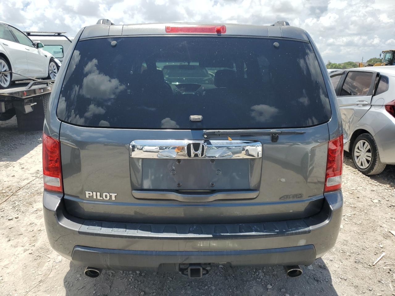 2010 Honda Pilot Ex VIN: 5FNYF4H45AB005424 Lot: 63074834