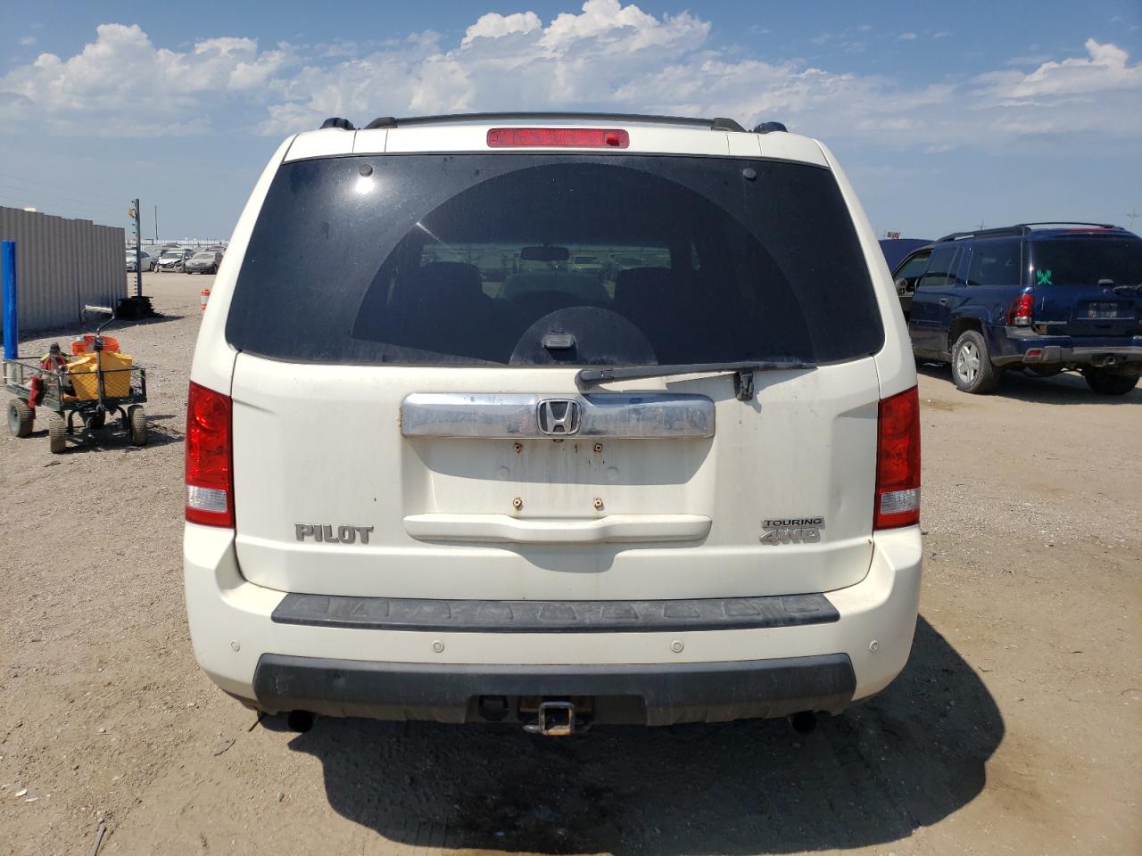 2011 Honda Pilot Touring VIN: 5FNYF4H93BB082581 Lot: 61079114