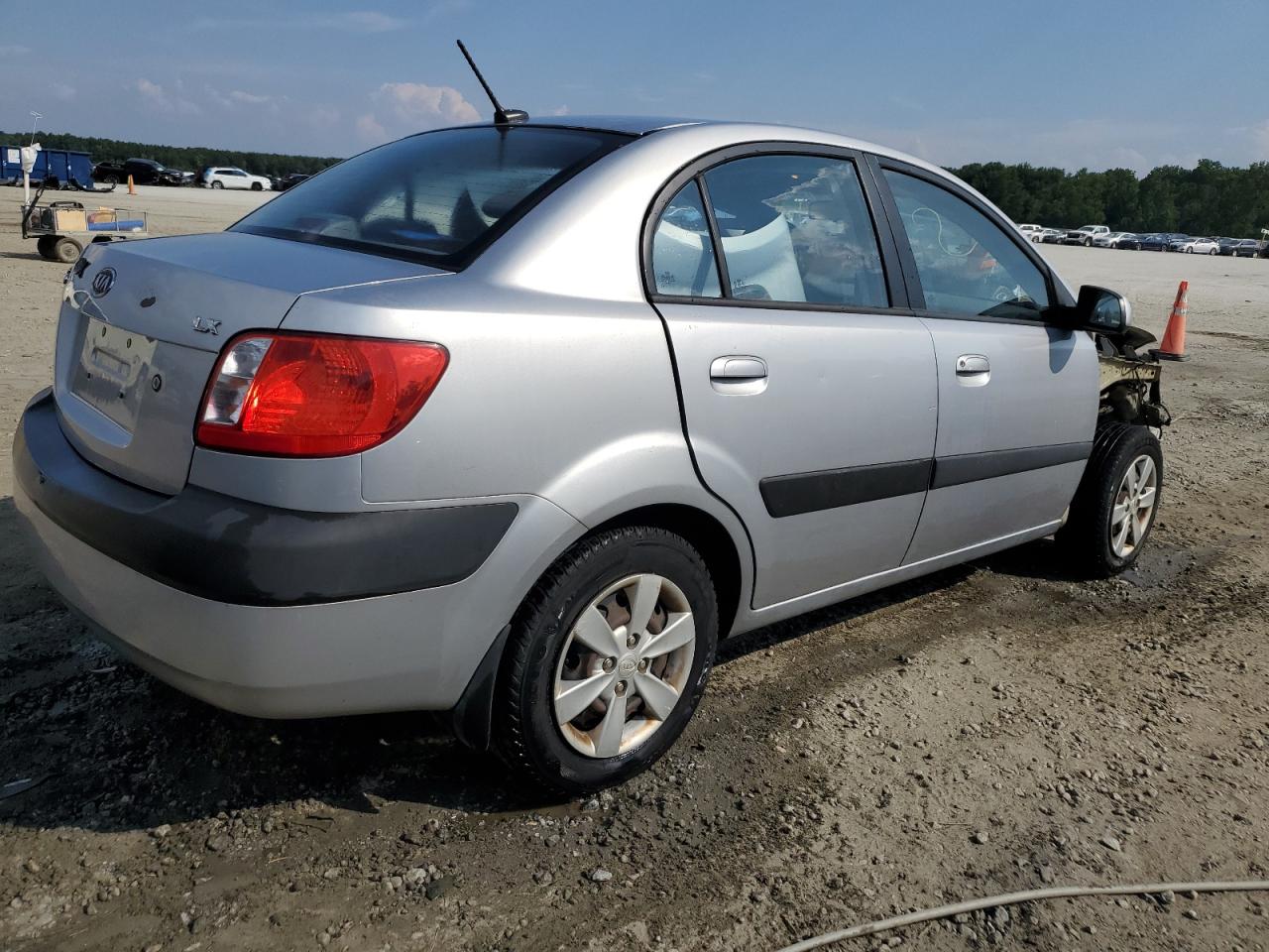 2009 Kia Rio Base VIN: KNADE223096573574 Lot: 63005154